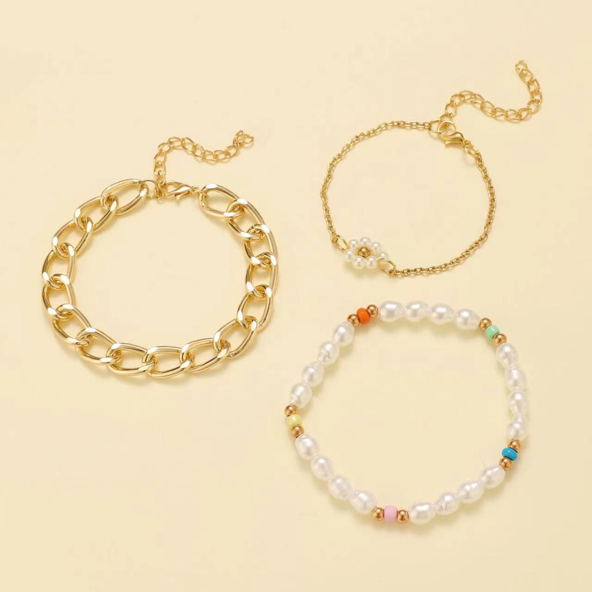 Set de pulseras de perlas con margaritas