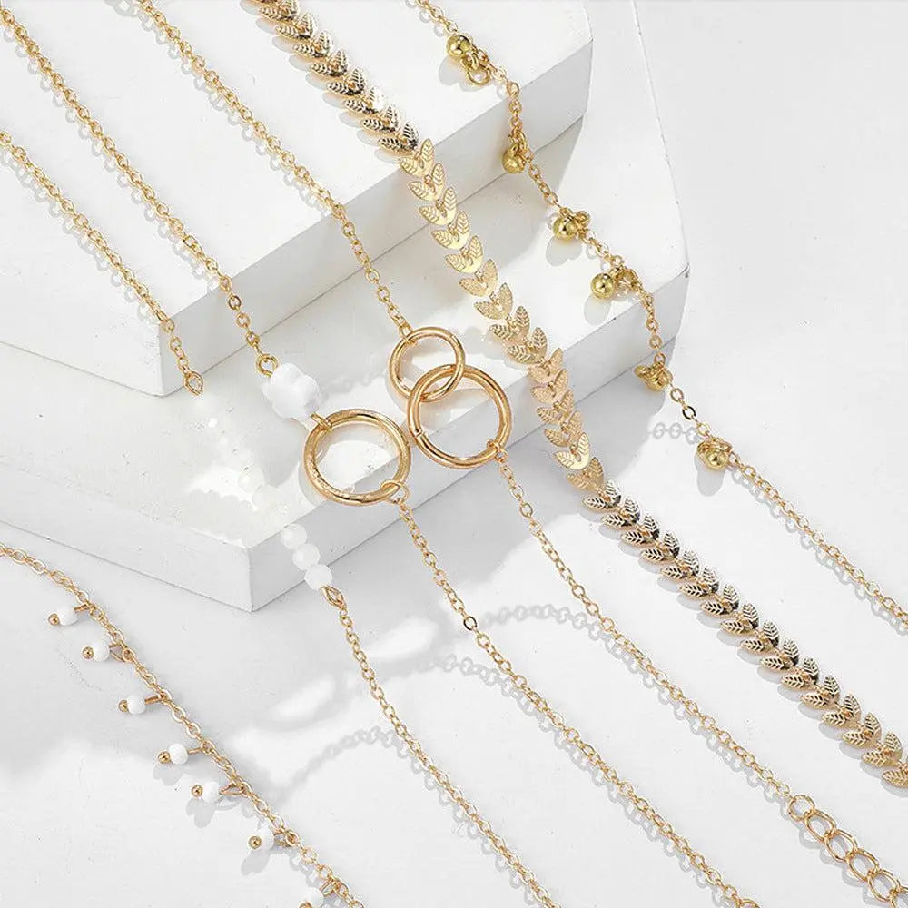 Conjunto encantador de pulseras boho doradas