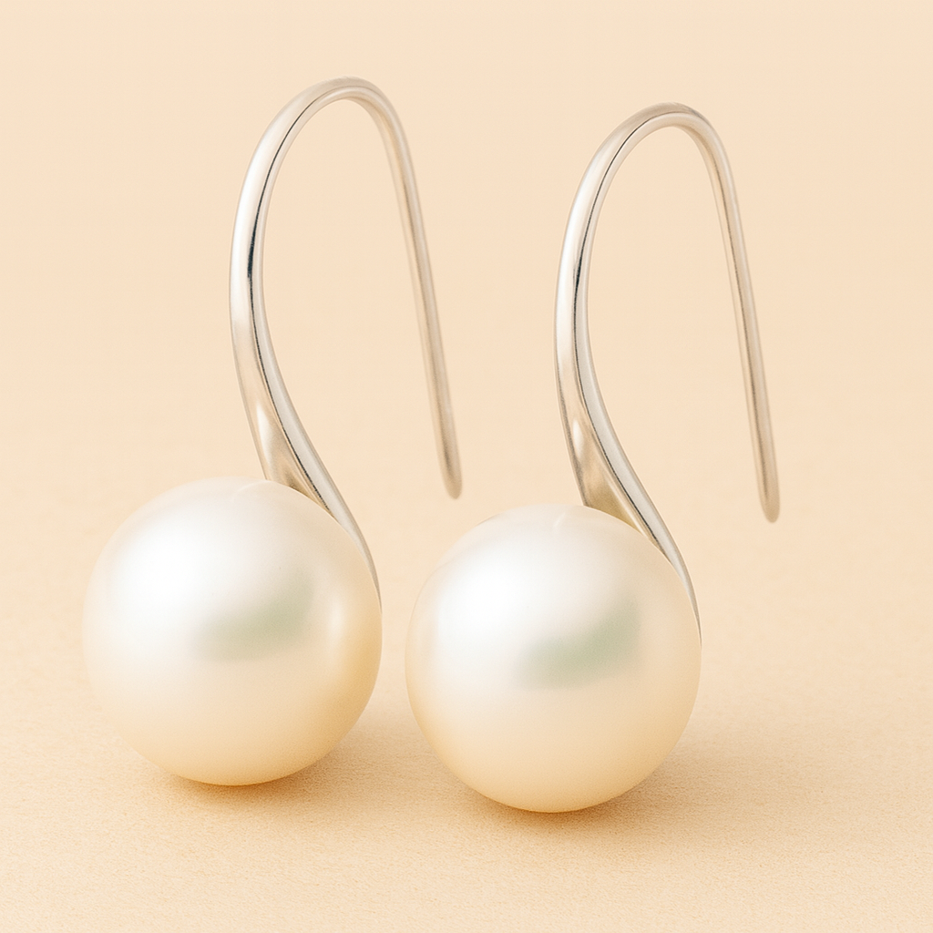 Aretes colgantes elegantes con perlas