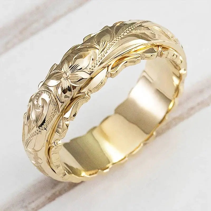 Anillo de flor en oro de inspiración antigua