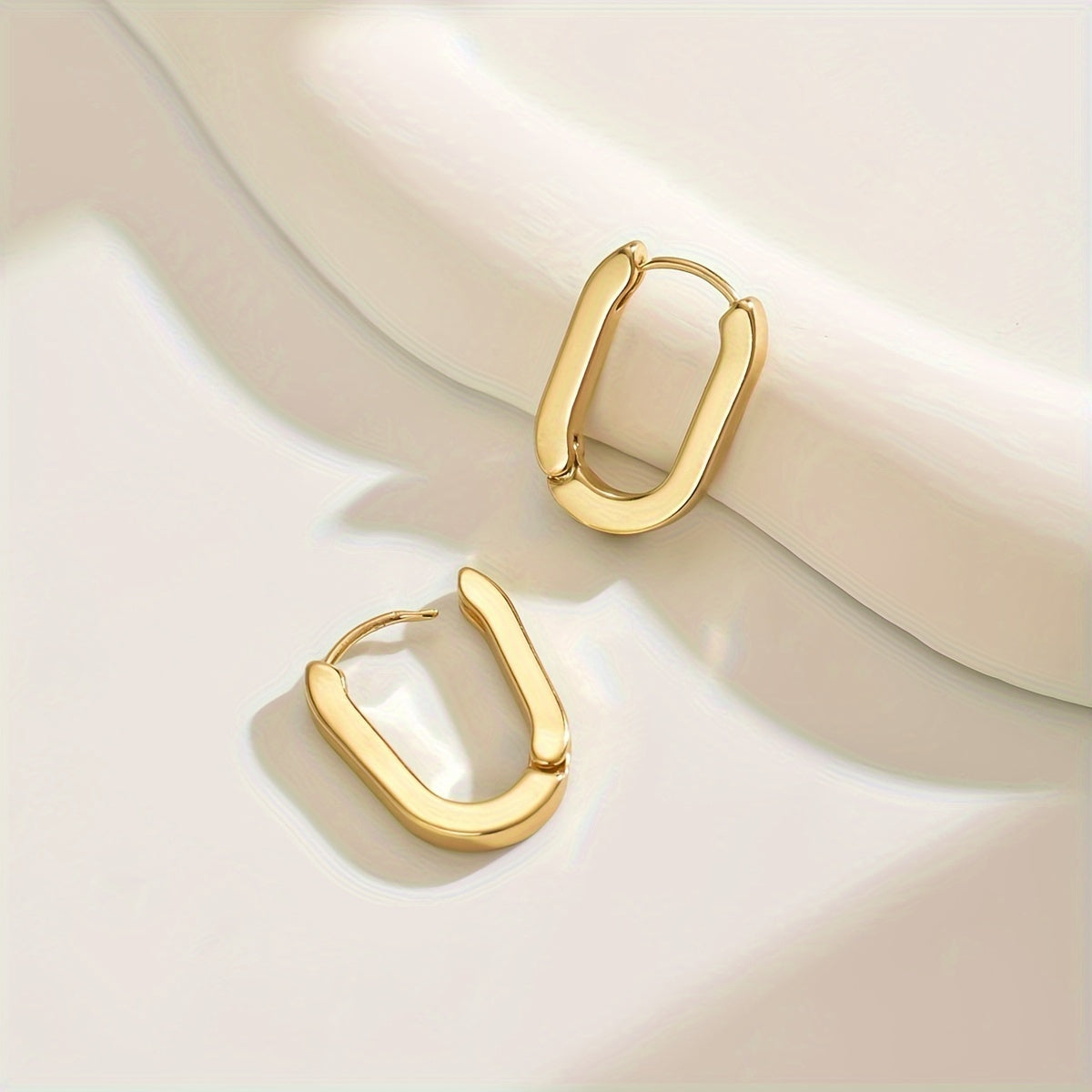 Aretes de aro geométricos elegantes