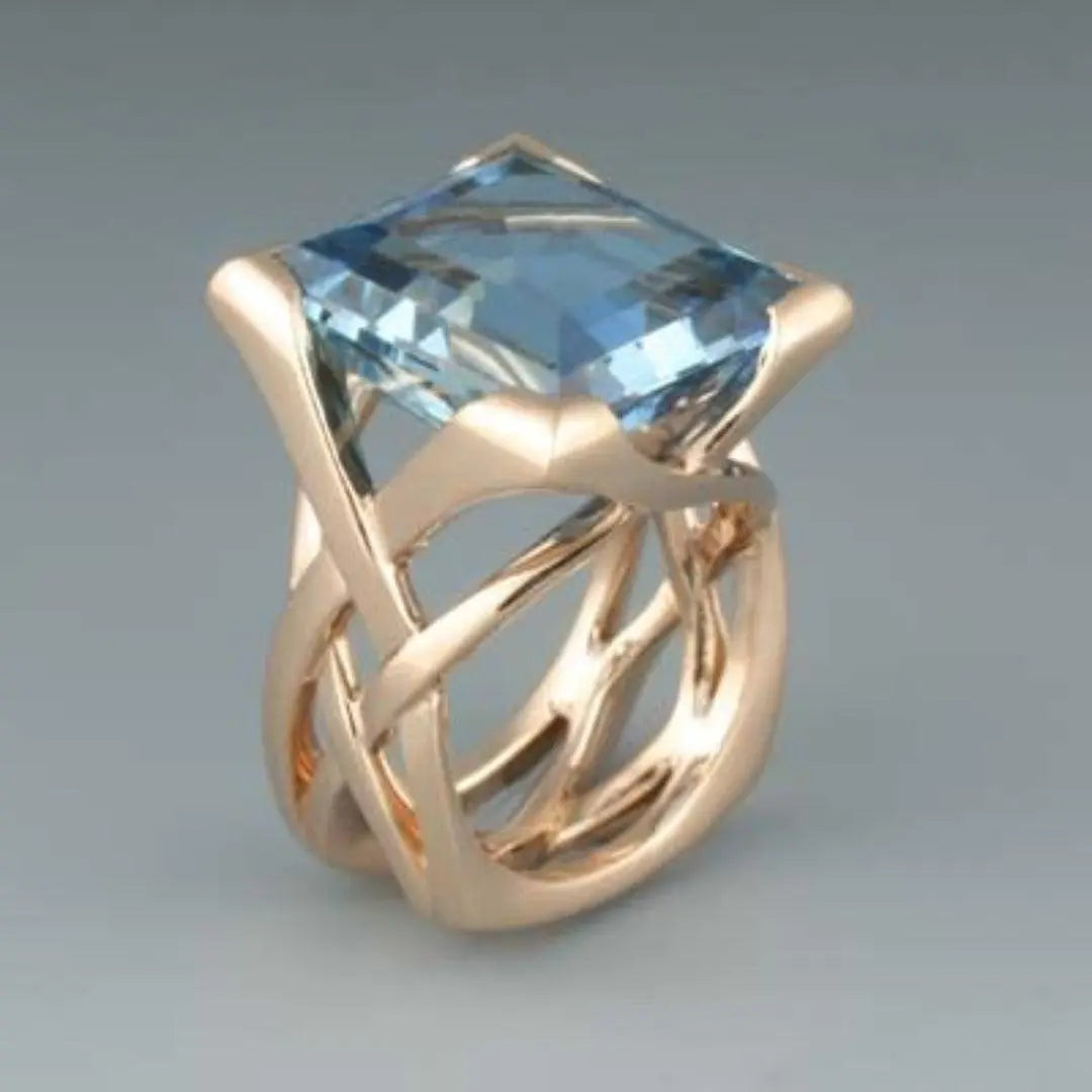Anello vintage in oro rosa con zircone blu