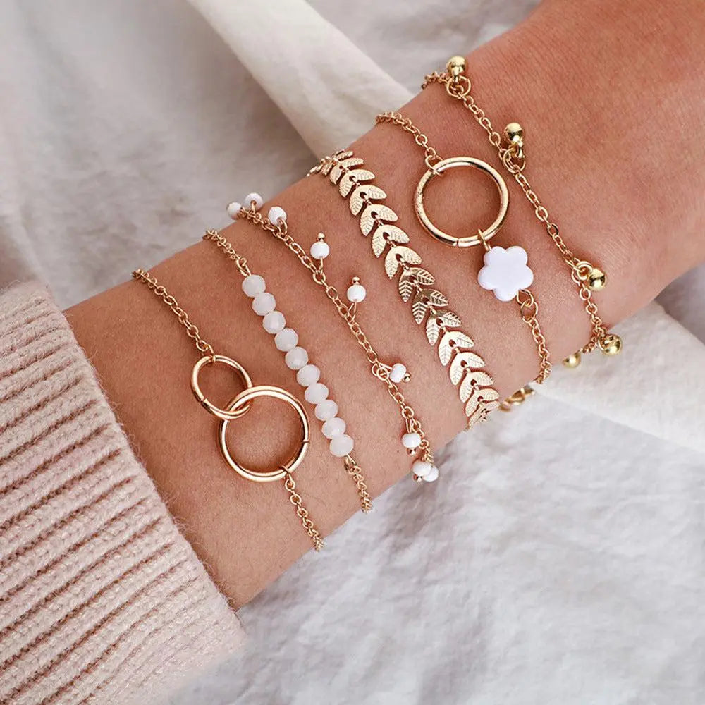 Conjunto encantador de pulseras boho doradas