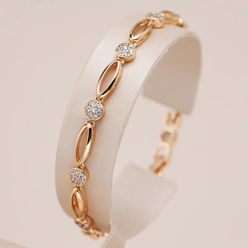 Pulsera elegante chapada en oro con circonias