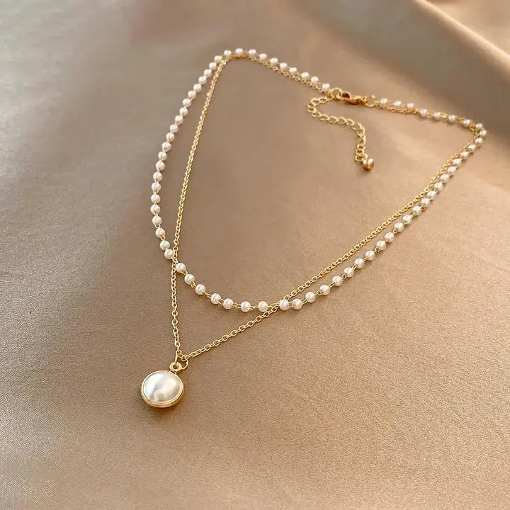 Collana senza tempo in oro con perla elegante