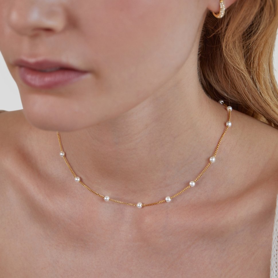 Collar de cadena con perlas