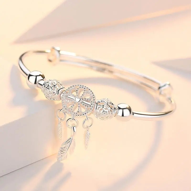 Bracciale regolabile con acchiappasogni in argento 925